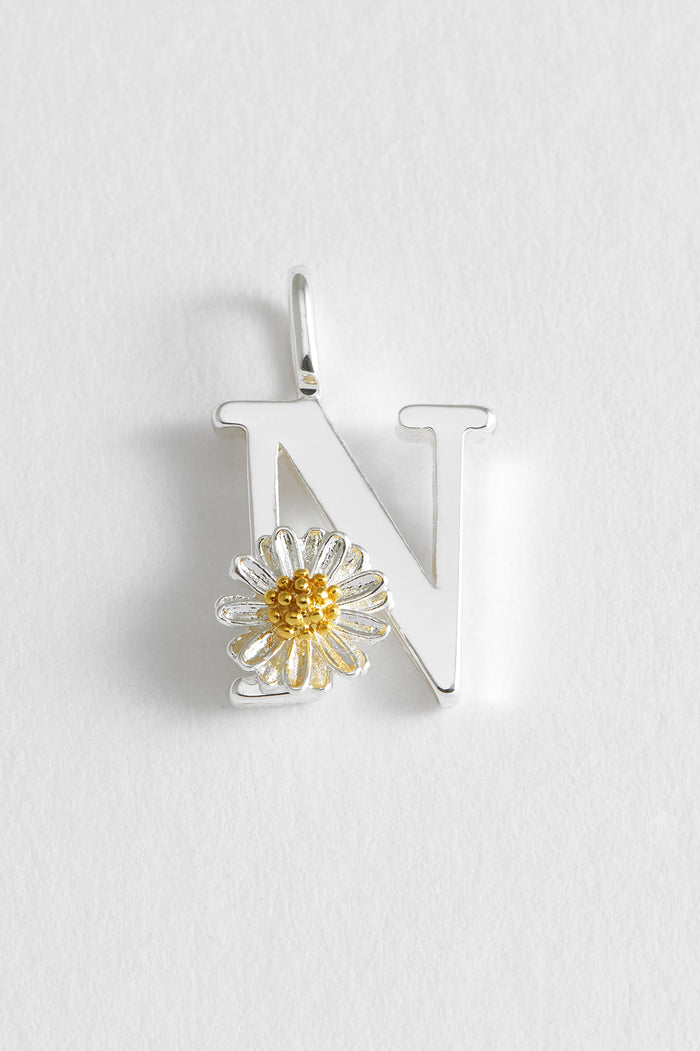 estella bartlett Wildflower Initial Charm Silver Plated | N