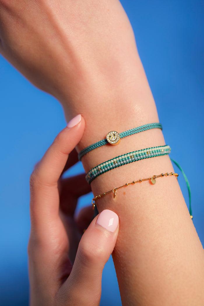 Estella Bartlett Woven Duo Beaded Charm Bracelets Gold Plated | Green Packaging Message: Follow The Fun
