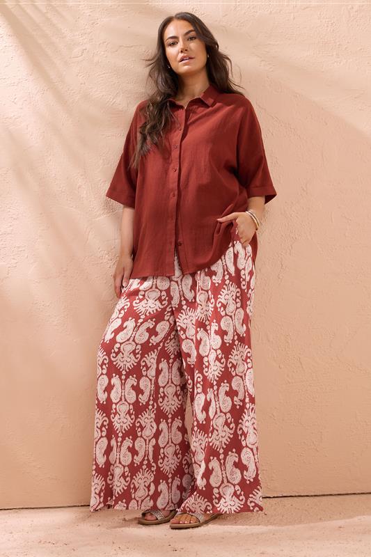 Evans EVANS Curve Rust Orange Paisley Crinkle Wide Leg Trousers