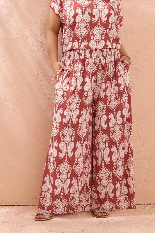 evans EVANS Curve Rust Orange Paisley Crinkle Wide Leg Trousers