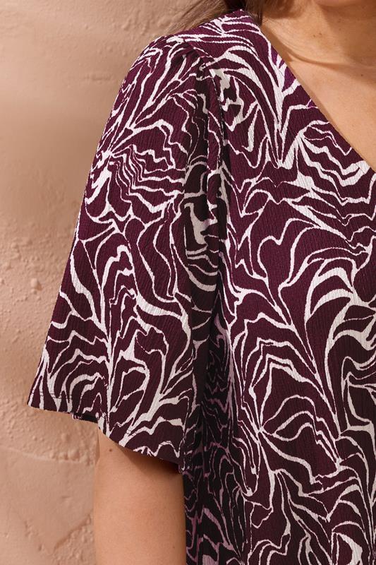 Evans EVANS Curve Purple Abstract Floral Swing Top