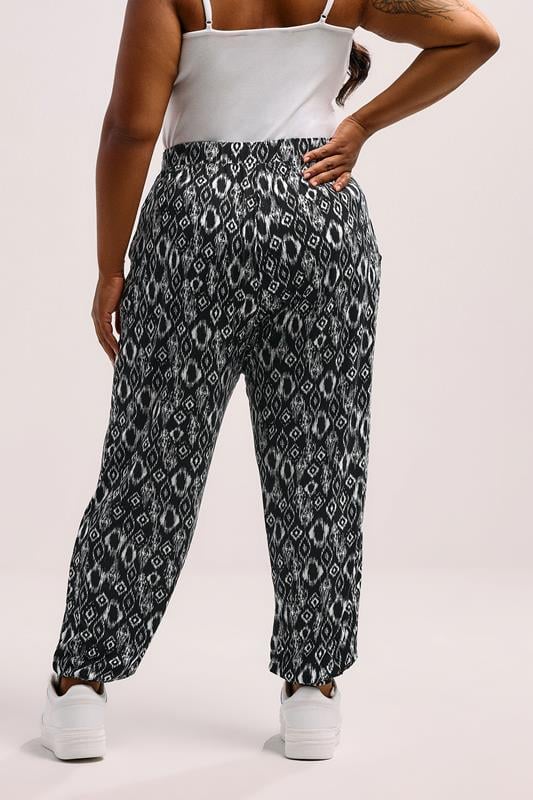 Evans YOURS Curve Black Ikat Cuffed Harem Trousers