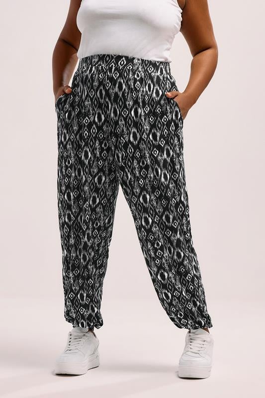 evans YOURS Curve Black Ikat Cuffed Harem Trousers