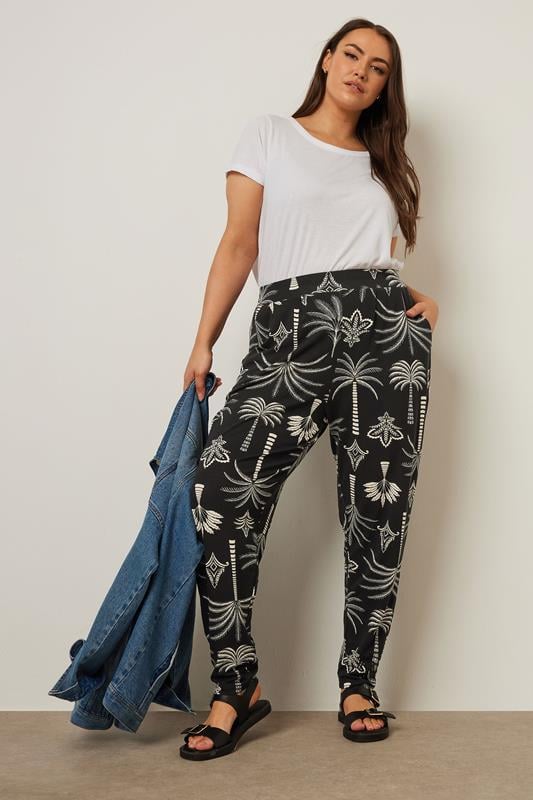 Evans YOURS Curve Black Palm Print Harem Trousers