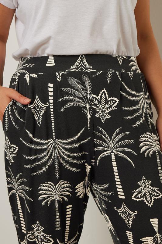 Evans YOURS Curve Black Palm Print Harem Trousers