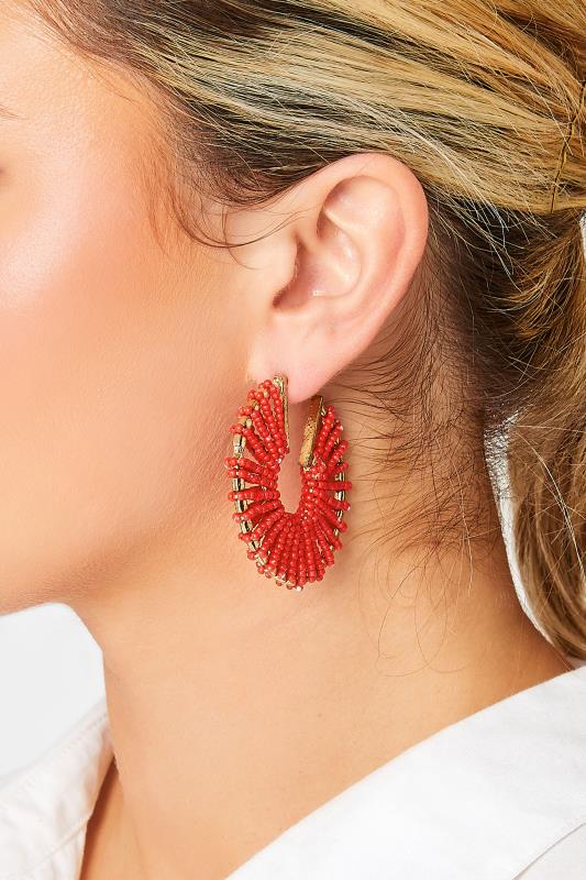evans Yours Gold Tone & Red Seed Bead Hoop Earrings