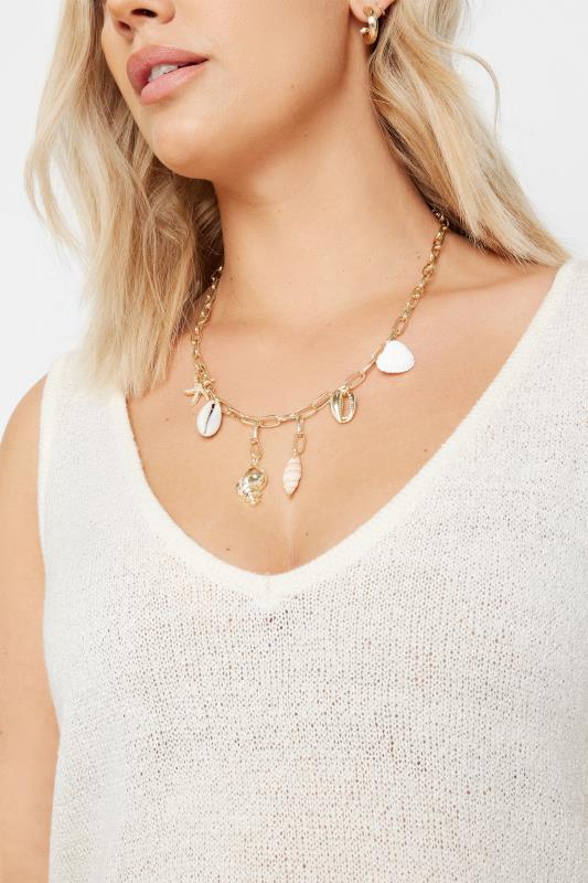 evans Yours Gold Tone Shell Charm Droplet Necklace