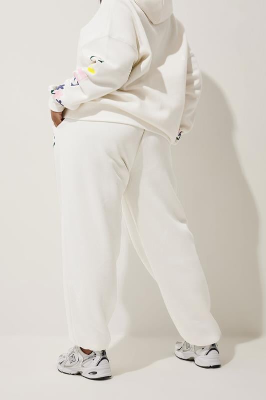 Evans LIMITED COLLECTION Curve Cream Floral Graphic Cuffed Joggers
