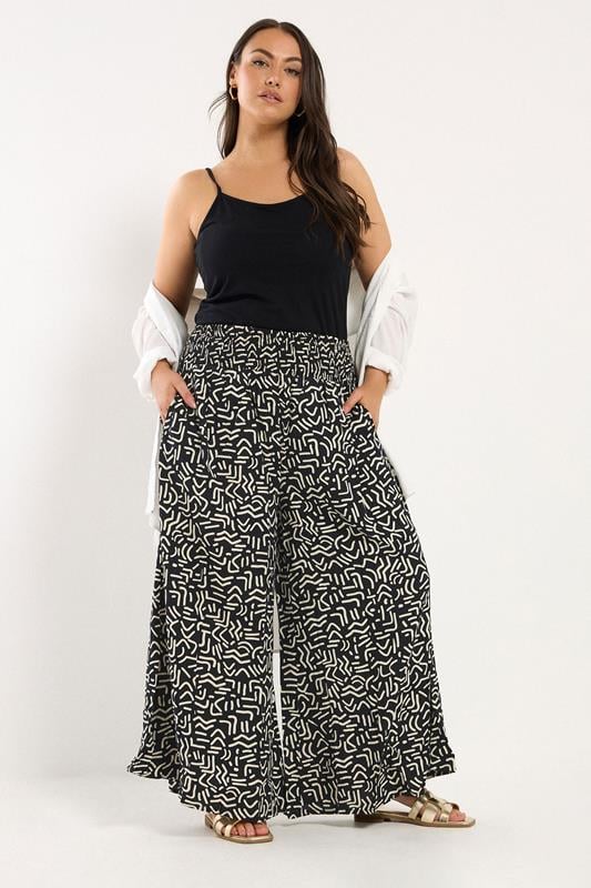 evans YOURS Curve Black Abstract Print Shirred Waist Trousers