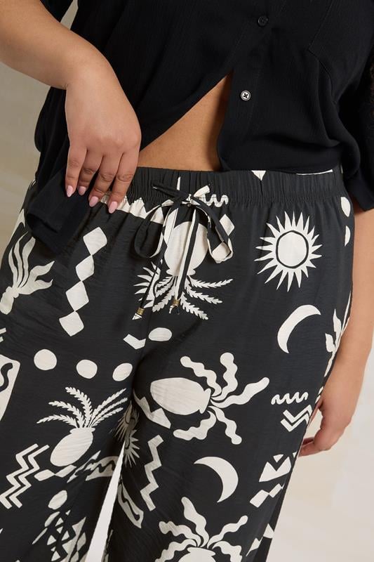 Evans YOURS Curve Black Abstract Print Twill Wide Leg Trousers