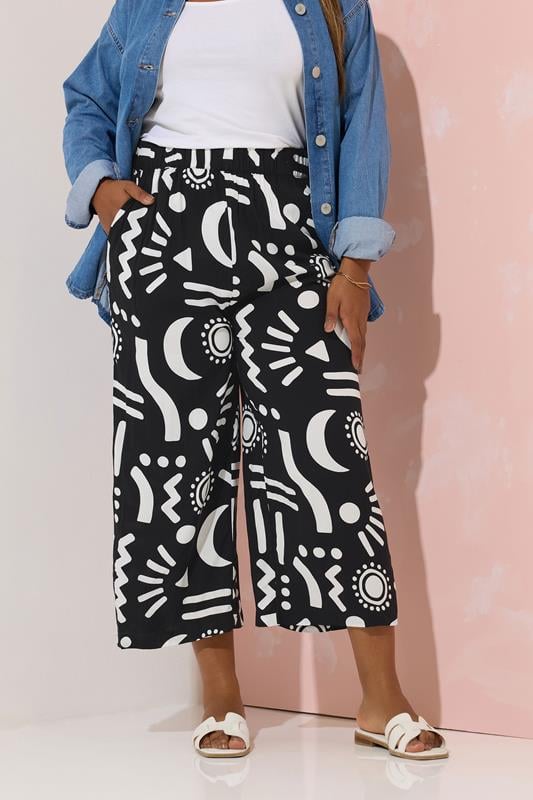 evans YOURS Curve Black Abstract Print Wide Leg Cropped Trousers