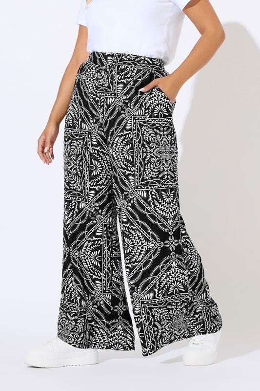 Evans YOURS Curve Black Bandana Print Textured Wide Leg Trousers