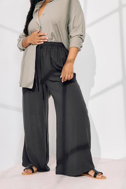 Evans YOURS Curve Black Chambray Tie Front Wide Leg Trousers
