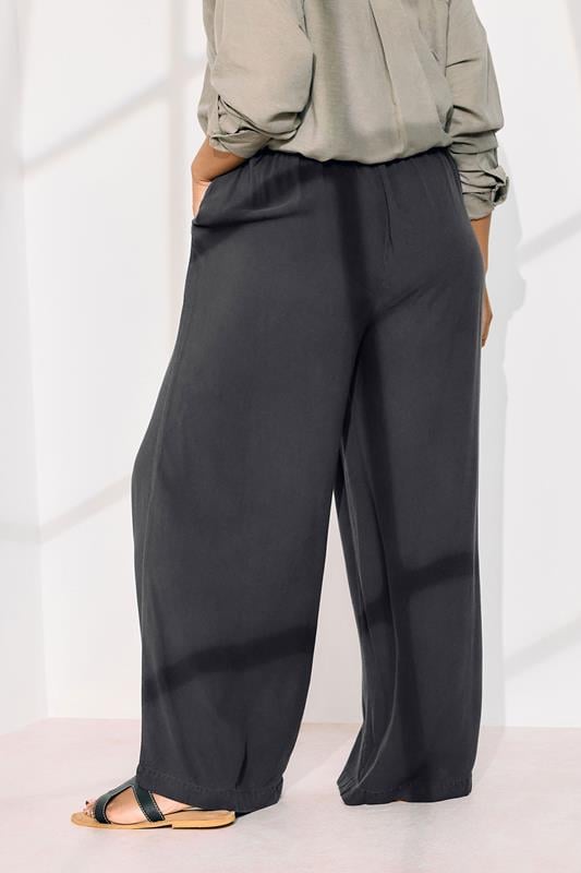 Evans YOURS Curve Black Chambray Tie Front Wide Leg Trousers