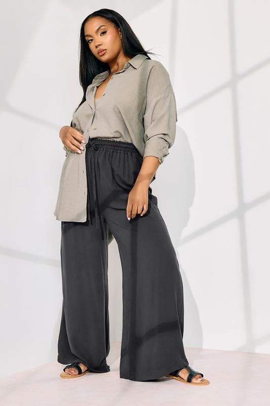 evans YOURS Curve Black Chambray Tie Front Wide Leg Trousers