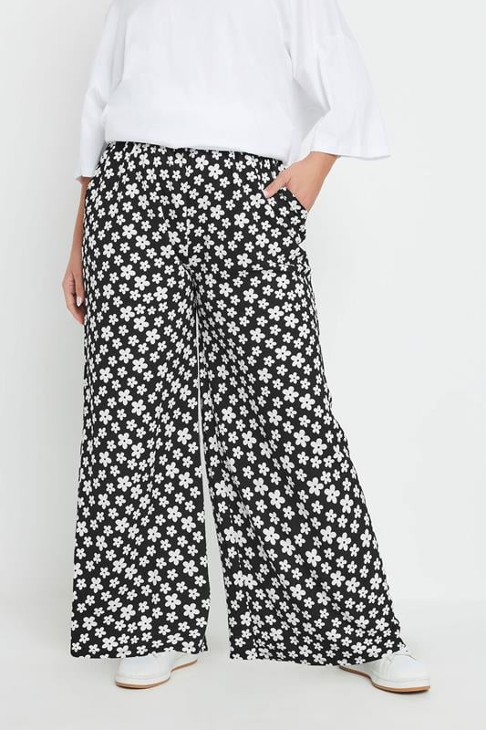 evans YOURS Curve Black Ditsy Floral Wide Leg Trousers