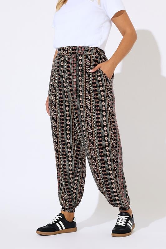 Evans YOURS Curve Black Floral Paisley Cuffed Harem Trousers