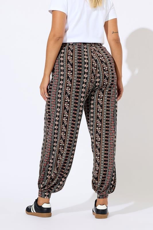 Evans YOURS Curve Black Floral Paisley Cuffed Harem Trousers
