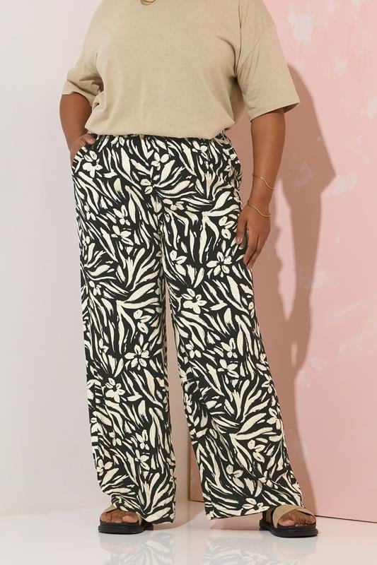 evans YOURS Curve Black Floral Print Wide Leg Trousers