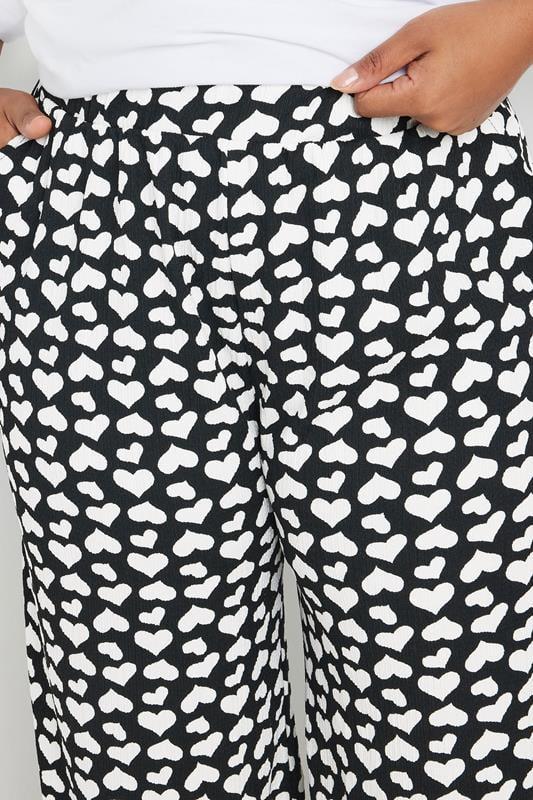 Evans YOURS Curve Black Heart Print Wide Leg Trousers