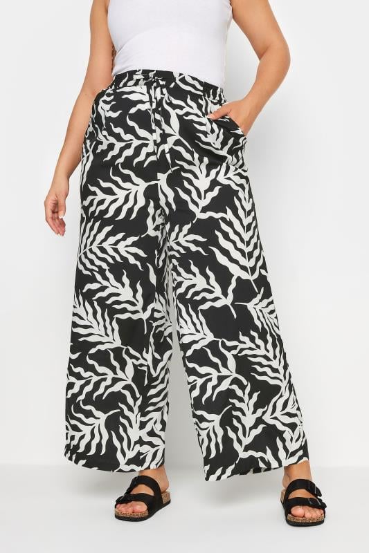 Evans Yours Curve Black Leaf Print Drawstring Wide Leg Trousers