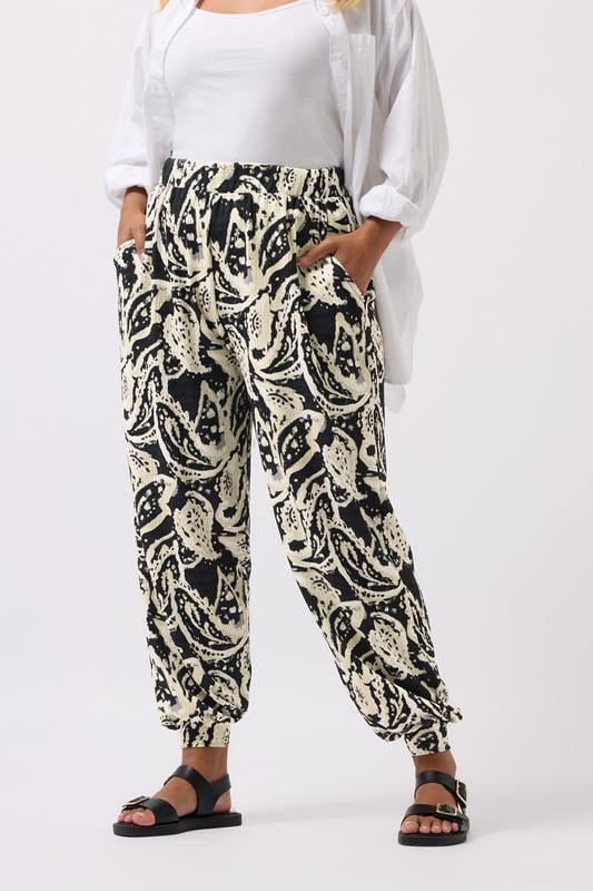 evans YOURS Curve Black Paisley Cuffed Harem Trousers