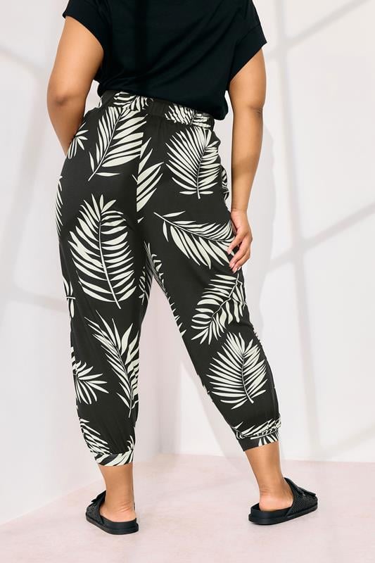 Evans YOURS Curve Black Palm Leaf Cropped Harem Trousers