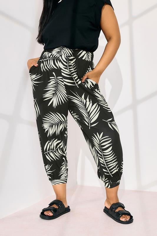 Evans YOURS Curve Black Palm Leaf Cropped Harem Trousers