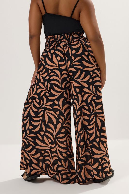Evans YOURS Curve Black Palm Leaf Shirred Waist Trousers