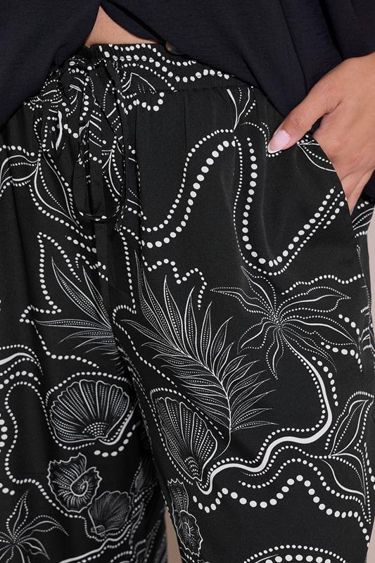 Evans YOURS Curve Black Shell Print Wide Leg Trousers