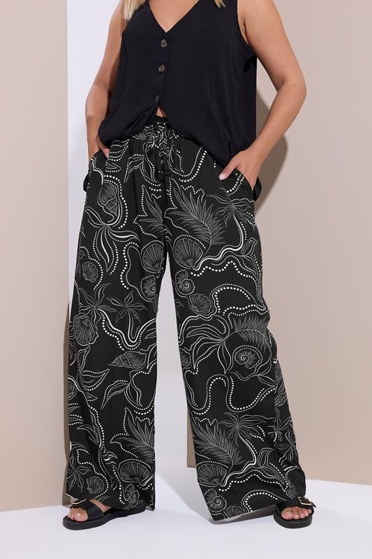 evans YOURS Curve Black Shell Print Wide Leg Trousers
