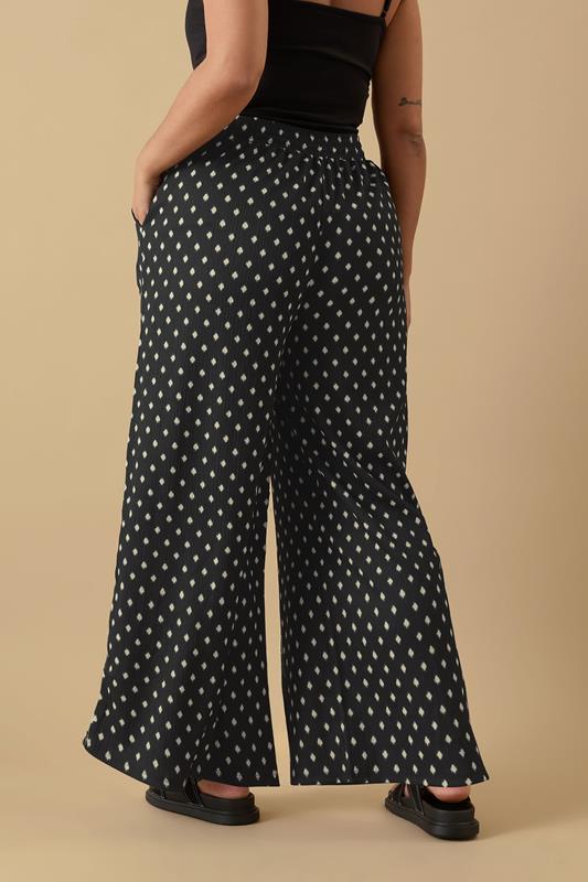 Evans YOURS Curve Black Textured Spot Print Wide Leg Trousers