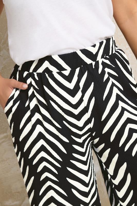 Evans YOURS Curve Black & White Abstract Print Wide Leg Trousers