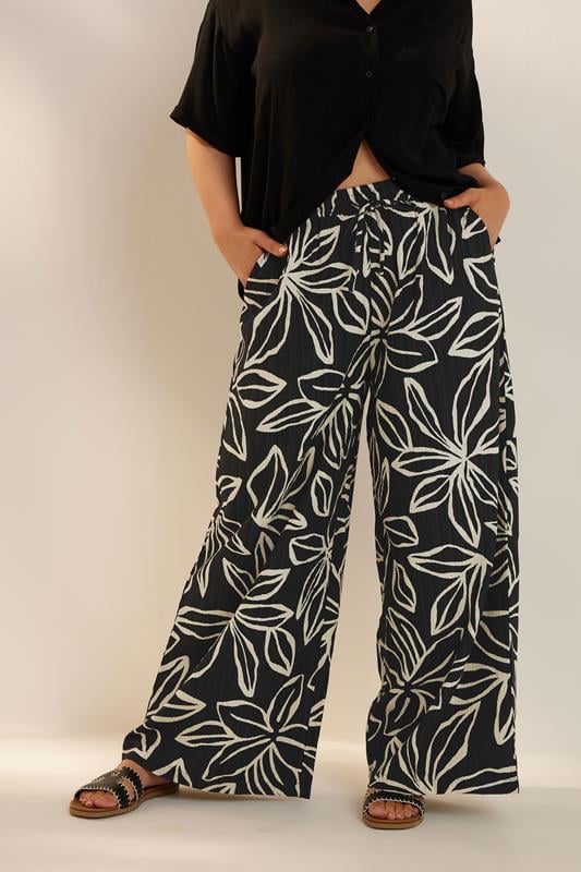 evans YOURS Curve Black & White Floral Print Textured Wide Leg Trousers
