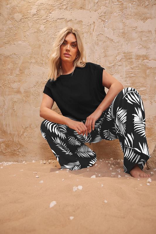 evans YOURS Curve Black & White Palm Print Crinkle Wide Leg Trousers