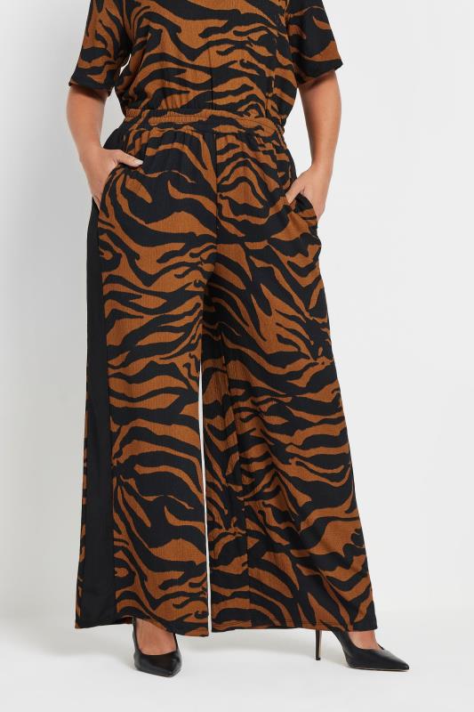 evans YOURS Curve Black Zebra Print Side Stripe Trousers