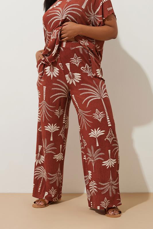 Evans YOURS Curve Brown Palm Print Plisse Wide Leg Trousers