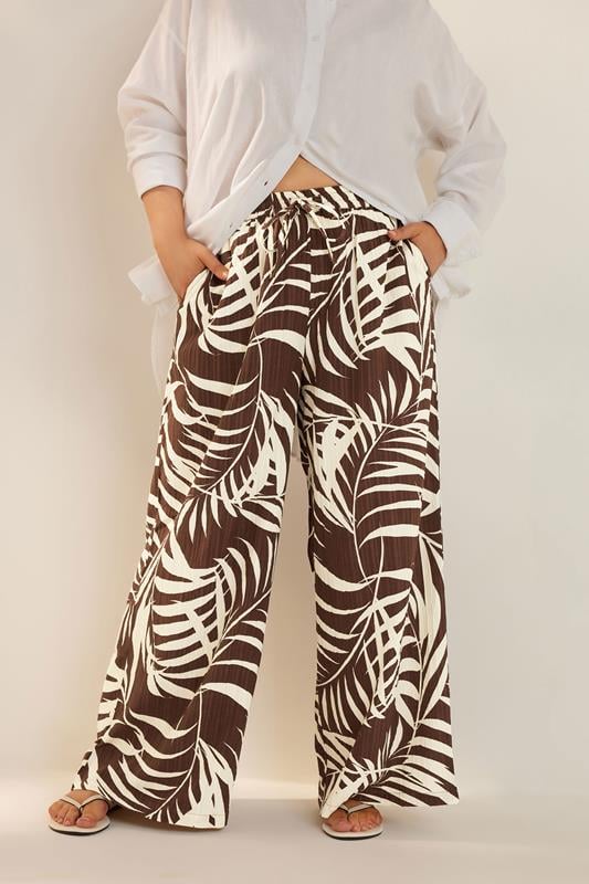 evans YOURS Curve Brown Palm Print Textured Wide Leg Trousers