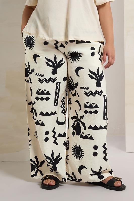 evans YOURS Curve Cream Abstract Print Twill Wide Leg Trousers