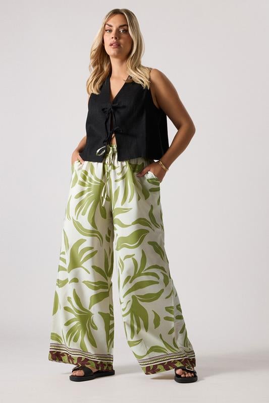 Evans YOURS Curve Light Green Leaf Print Wide Leg Trousers
