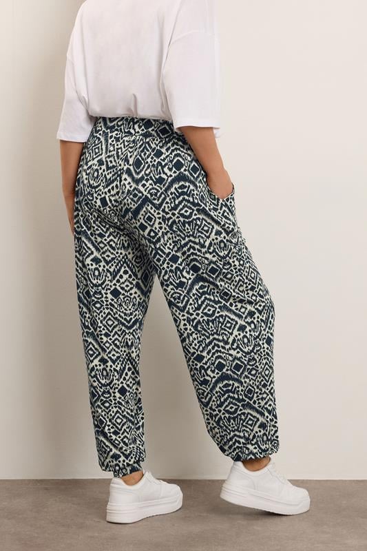 Evans YOURS Curve Navy Blue Abstract Cuffed Harem Trousers