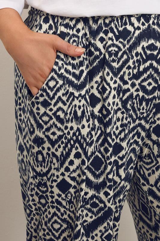 Evans YOURS Curve Navy Blue Abstract Cuffed Harem Trousers