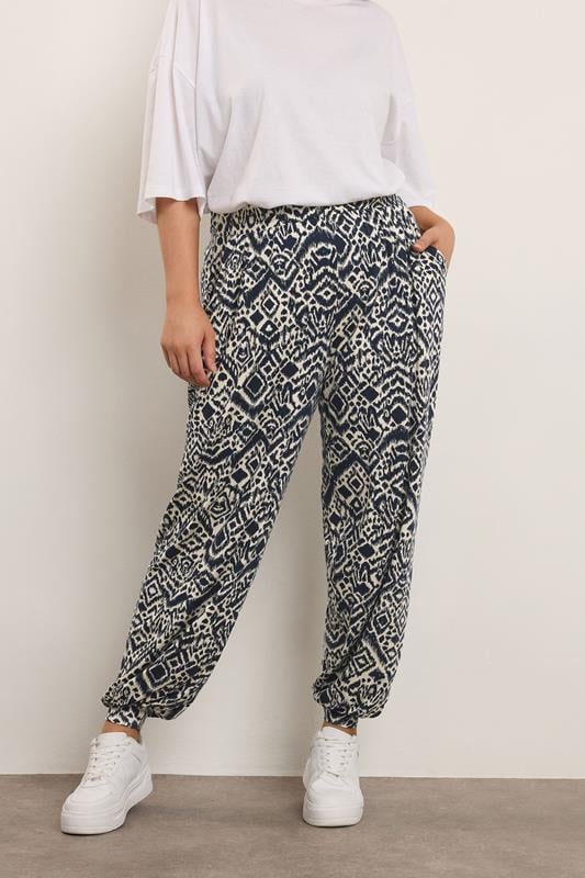 evans YOURS Curve Navy Blue Abstract Cuffed Harem Trousers