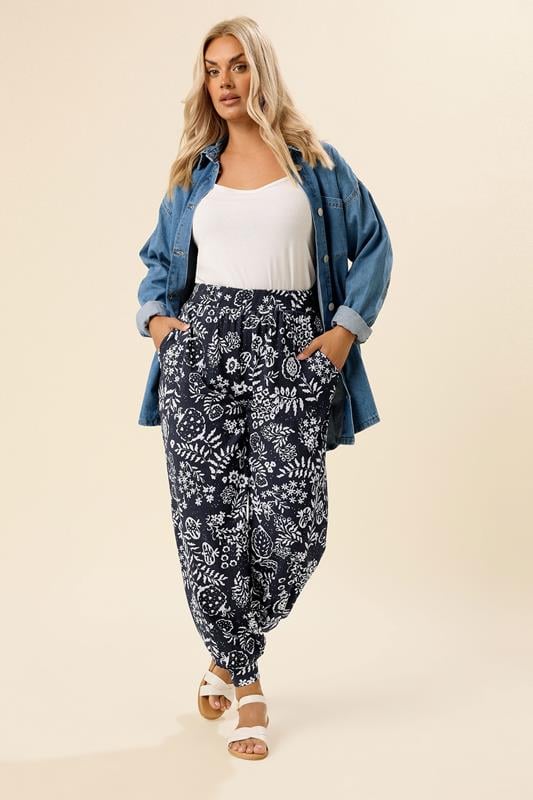 Evans YOURS Curve Navy Blue Leaf Print Cuffed Harem Trousers