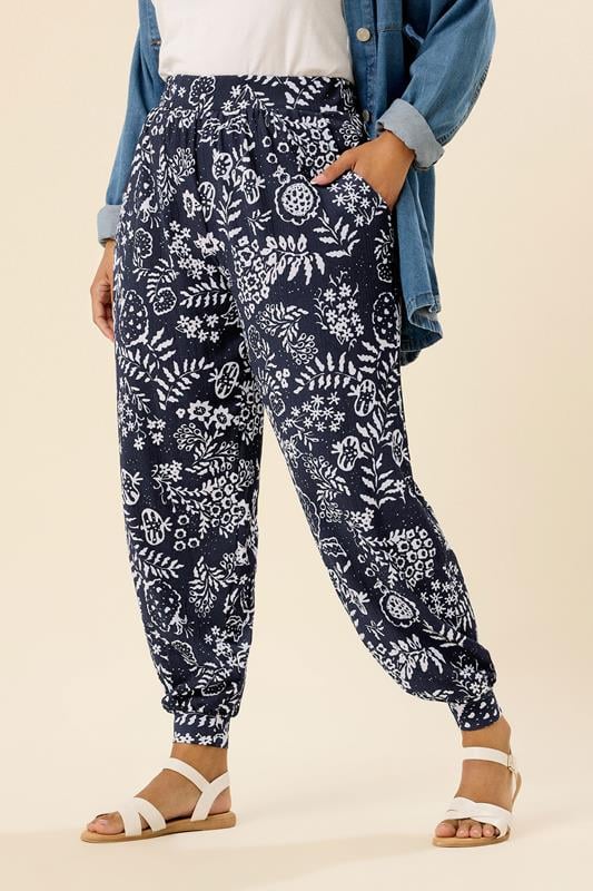 evans YOURS Curve Navy Blue Leaf Print Cuffed Harem Trousers