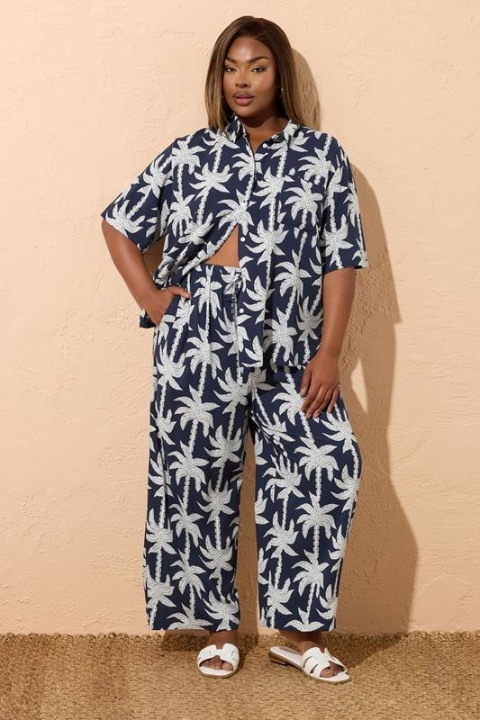 Evans YOURS Curve Navy Blue Tropical Palm Wide Leg Trousers
