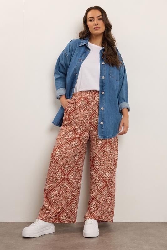 Evans YOURS Curve Rust Brown Paisley Crinkle Wide Leg Trousers