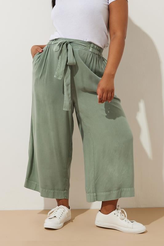 evans YOURS Curve Sage Green Chambray Tie Waist Cropped Trousers