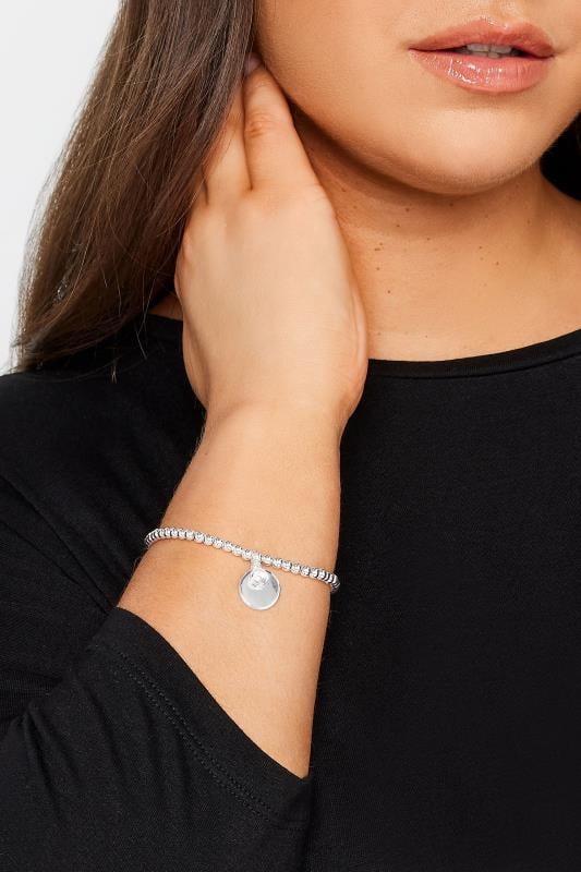 evans Yours Silver Tone Disc Charm Stretch Bracelet
