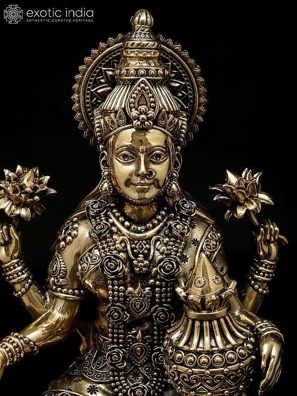 Exotic India 10" Superfine Four Armed Goddess Lakshmi With Wealth Pot | Brass Statue 